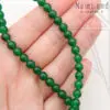 Халцедон (агат) зеленый круглый гладкий 1/2 нити 6 мм
