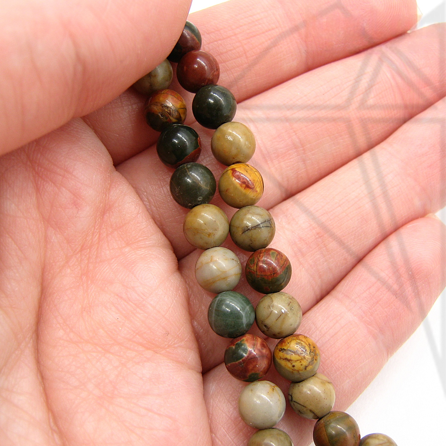 Яшма "Пикассо" круглая гладка глянцевая 1/2 нити 6 мм