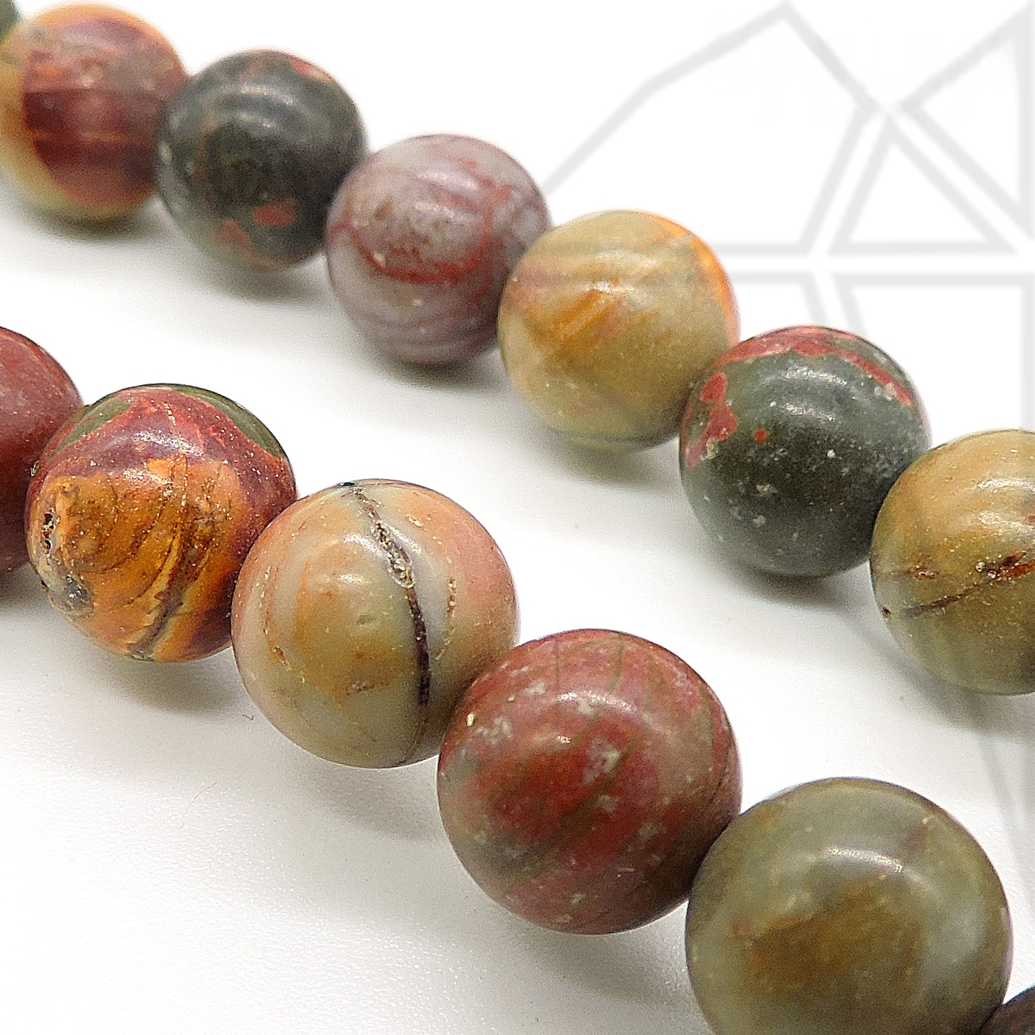 Яшма "Пикассо" круглая гладка глянцевая 1/2 нити 10 мм