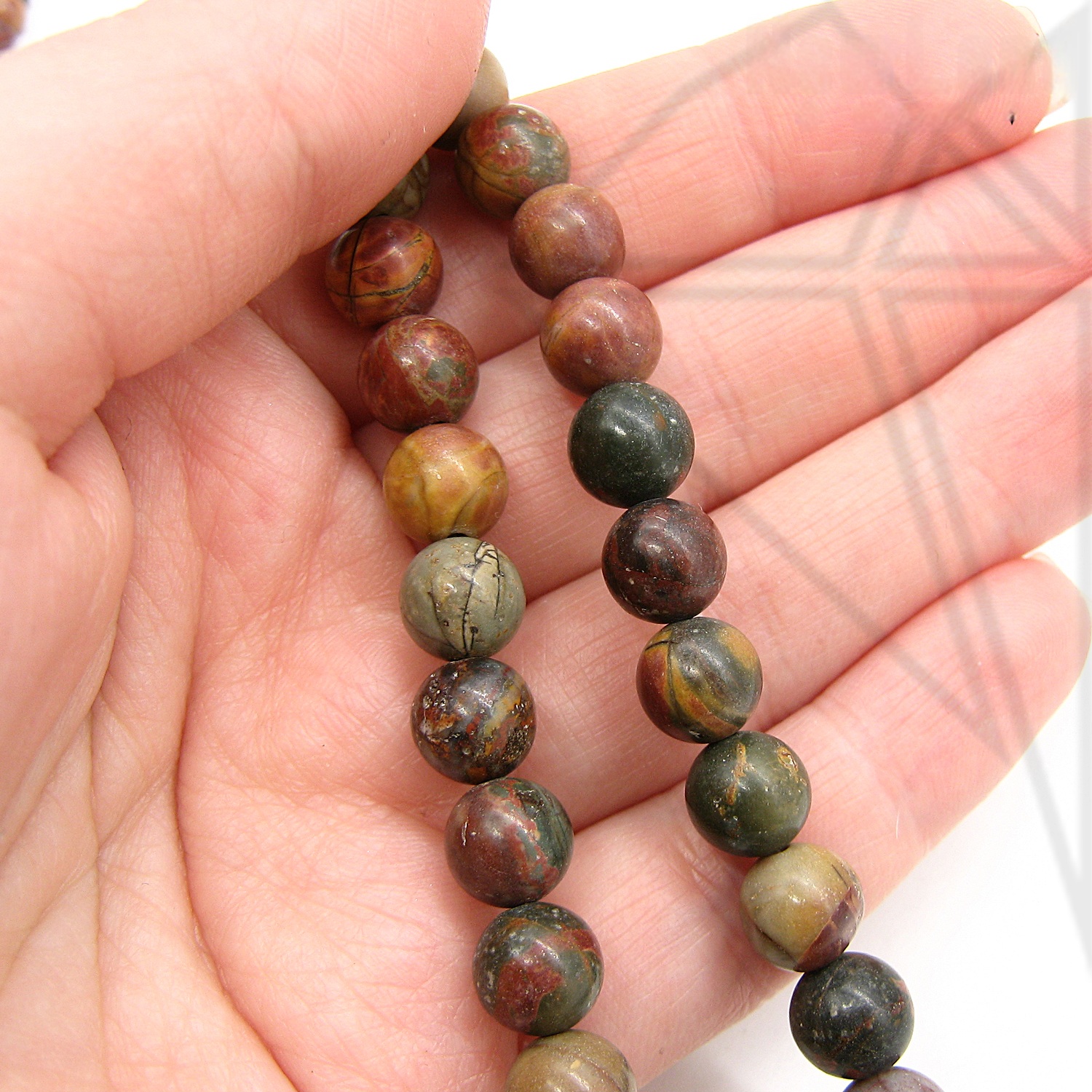 Яшма "Пикассо" круглая гладка глянцевая 1/2 нити 10 мм