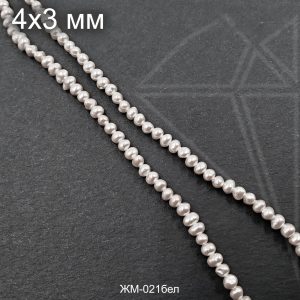 Жемчуг майорка белая 4х3 мм 0,5 нити